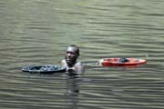 The salt is retrieving from the lake without any mechanization. Salt Lake, El Sod. South,  Ethiopia.