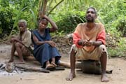 Pygmy village down to the Lobe River. The Pygmy people are forest dwellers, know the forest, its plants and its animals. They live by hunting animals such as antelopes, pigs and monkeys, fishing, and gathering honey, wild yams, berries and other plants. Cameroon.