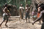 Traditional dance at Pygmy village down to the Lobe River. Cameroon.