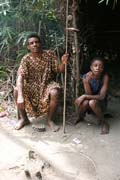 Pygmy village down to the Lobe River. The Pygmy people are forest dwellers, know the forest, its plants and its animals. They live by hunting animals such as antelopes, pigs and monkeys, fishing, and gathering honey, wild yams, berries and other plants. Cameroon.