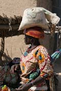 Everything is carried on the head. Market at Tourou village at Mandara Mountains. Cameroon.