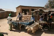 Sellers of dry fishes. Market at Tourou village at Mandara Mountains. Cameroon.