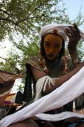 Man from nomadic Wodaab� tribe (also called Bororo) prepares himself for Yaake dance. Gerewol festival. Niger.