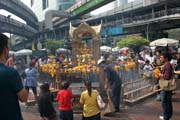 Erawan Shrine (San Phra Phrom) is situated in the middle of modern buildings, Bangkok. Thailand.
