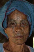 Woman from Chin tribe, Mrauk U area. Women have tradtionaly tattooed their faces. Myanmar (Burma).