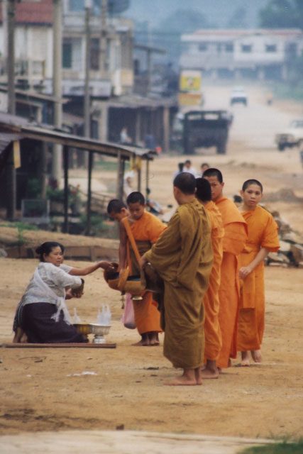 Morning offering in Phonsavan. Laos.
