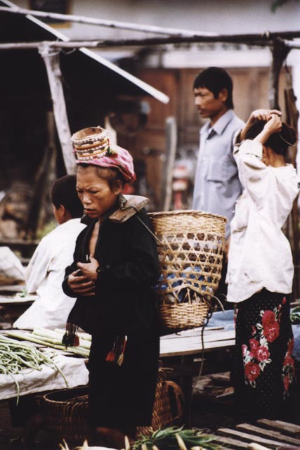 Woman from Akha hill tribe at Muang Sing market. Laos.