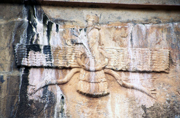 Zoroastrian God at tomb of king Artaxerxes II. Persepolis. Iran.