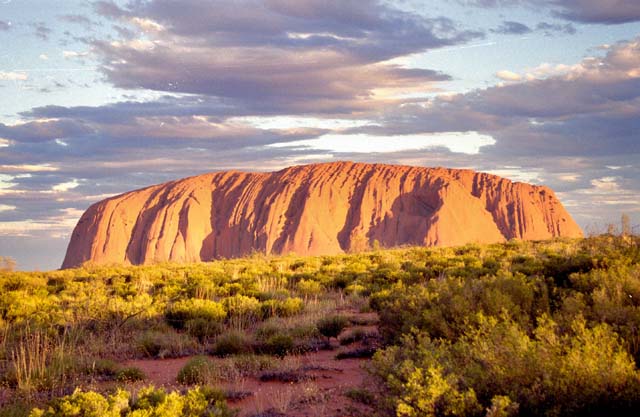 Ayers Rock (Uluru) in afternoon sun. Australia.