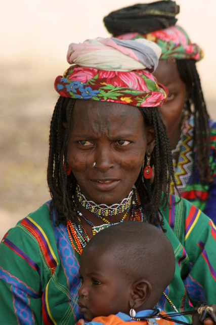 At street at Rey Bouba village. Women belong to the nomad part of Fulani ethnic. Cameroon.