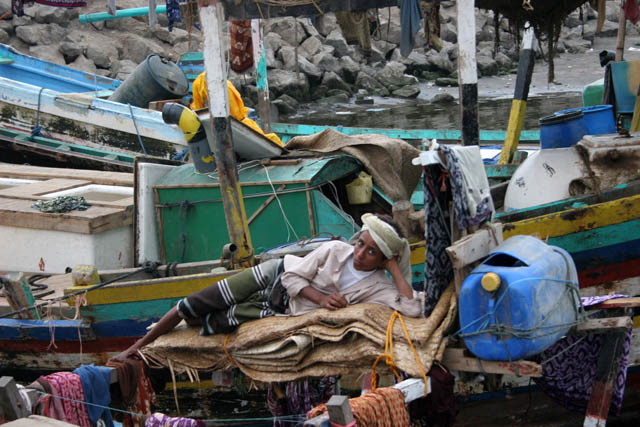 Rest before sail. Fish harbor at the edge of Al-Hudayda town. Yemen.