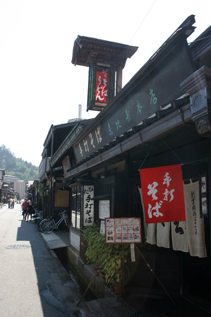 Traditional houses at Sanmachi-suji district, Takayama town. Originaly houses were merchant houses from Muromachi and Edo period, today they are mostly shops, restaurants and museums. Japan.