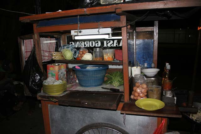 Street stall with fried rice (nasigoreng). Jakarta. Java,  Indonesia.
