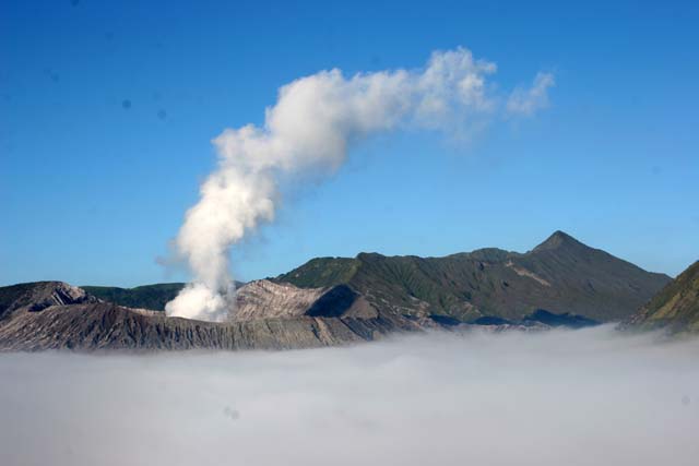 Gunung Bromo (Mount Bromo) at morning clouds. Java,  Indonesia.